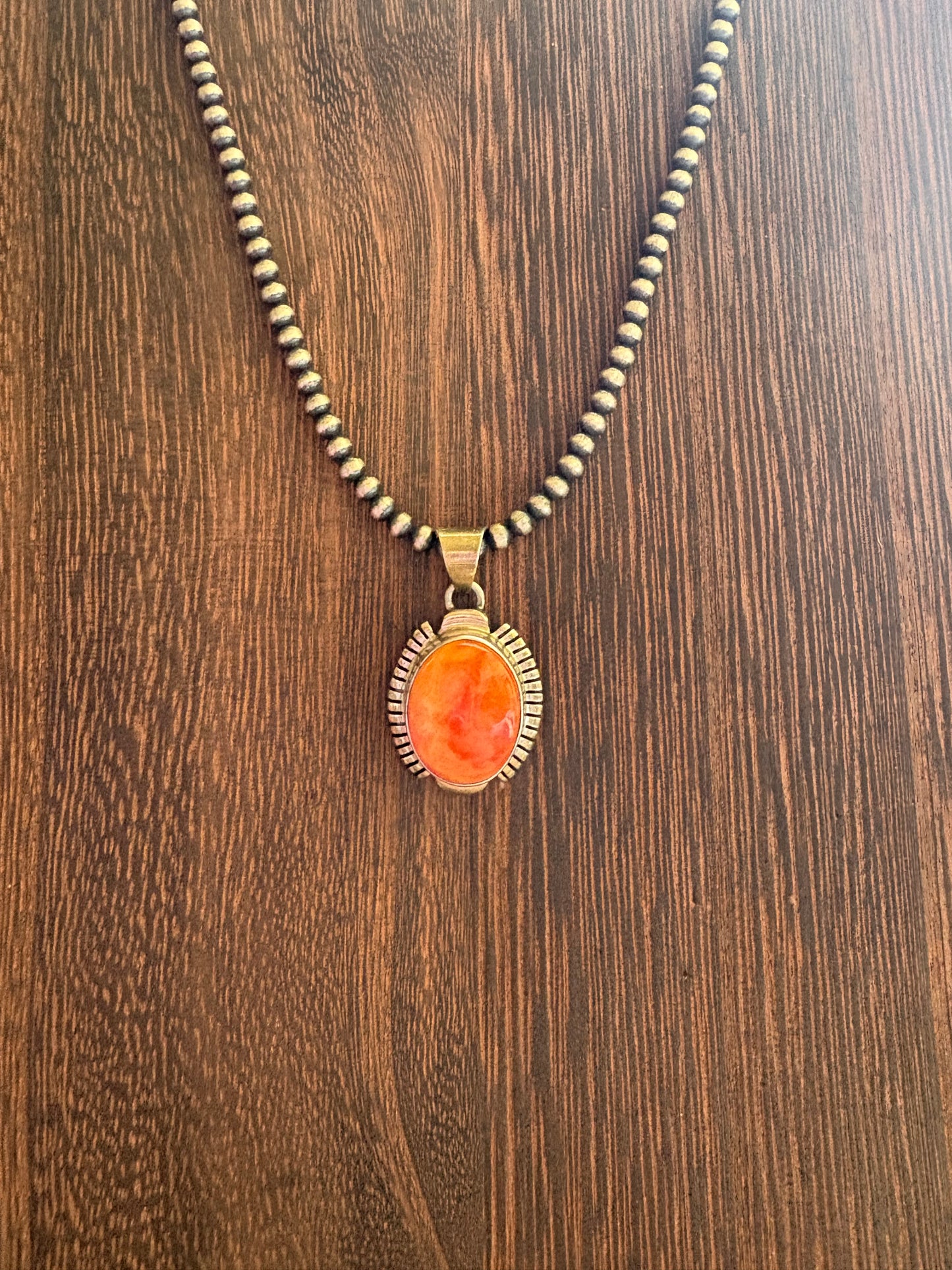 Navajo Handmade Orange Spiny Oval Pendant