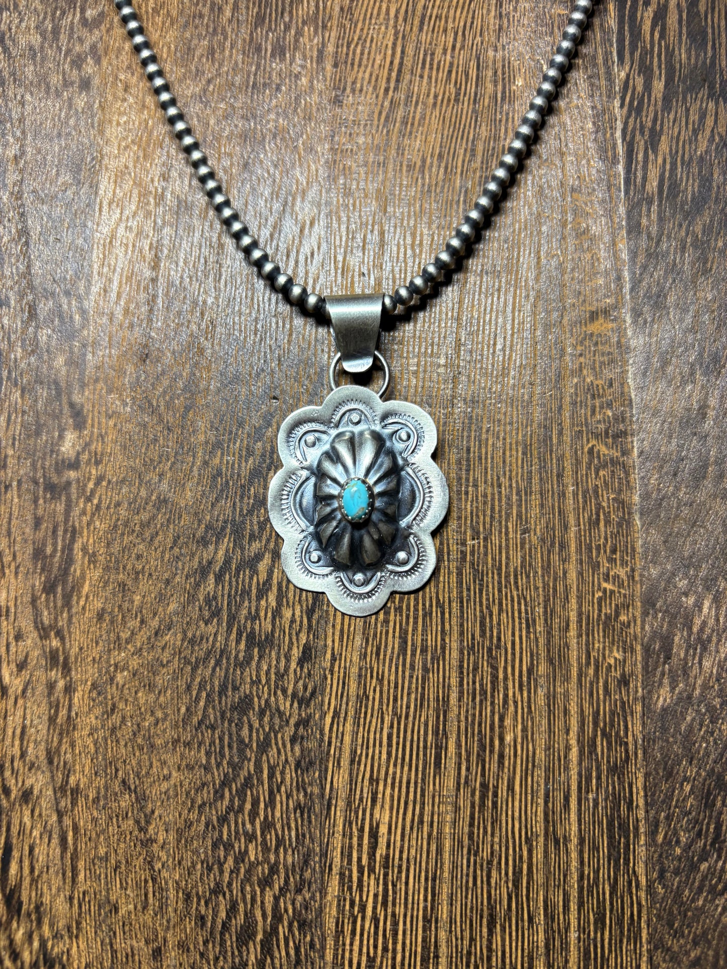 Navajo Handmade Concho Pendant